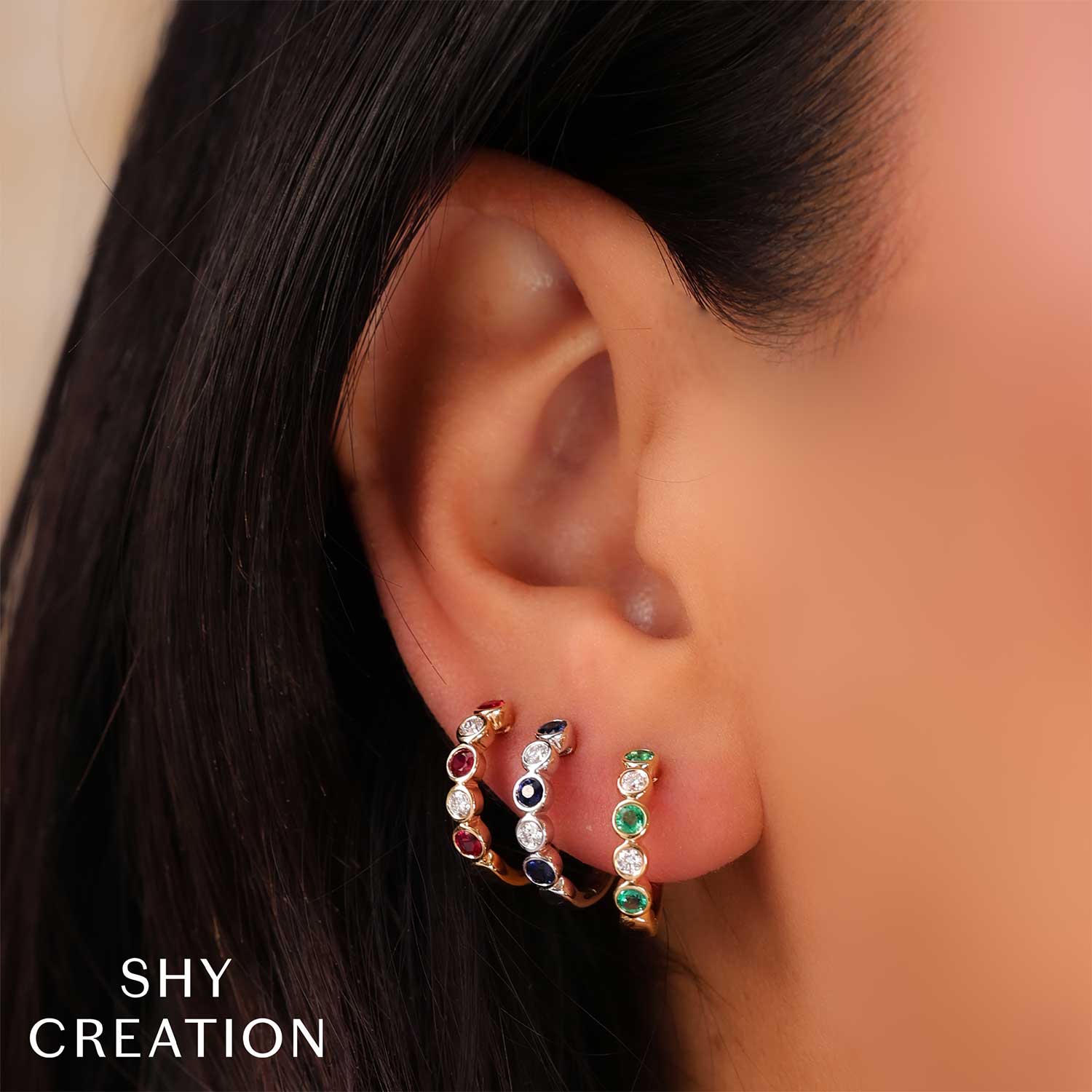 Shy Creation 14K Diamond and Emerald Bezel Huggie Earrings - Image 2